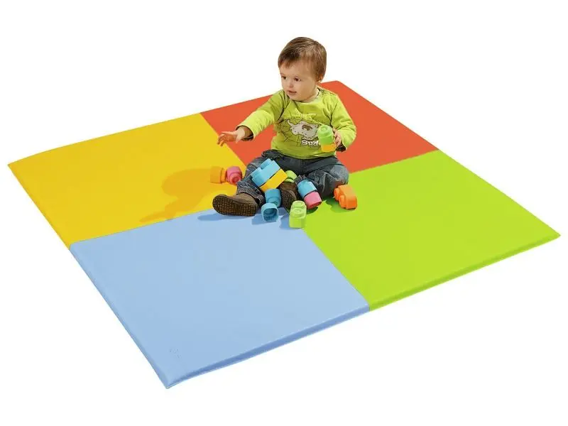 close-up of textured vinyl surface and colour contrast encouraging visual tracking and tactile exploration