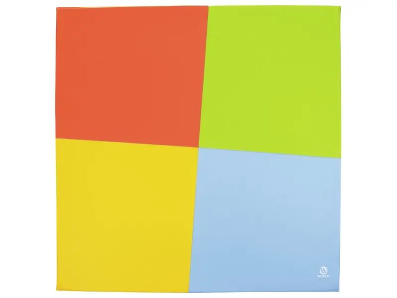 soft foam play mat in four bright colours arranged in uneven panels for sensory and motor skill activities