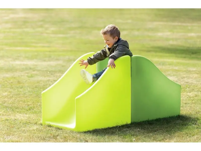 rigid plastic step-and-slide setup offering gentle height challenges for toddlers developing balance and mobility