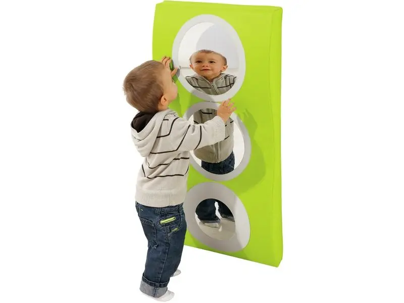 gently curved wall mat with built-in mirrors encouraging movement, observation, and early spatial awareness
