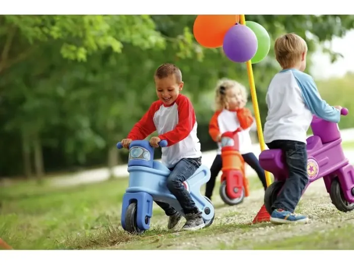 Blue Motorcycle toddler ride-on promoting coordination, steering control, and confidence in active play.