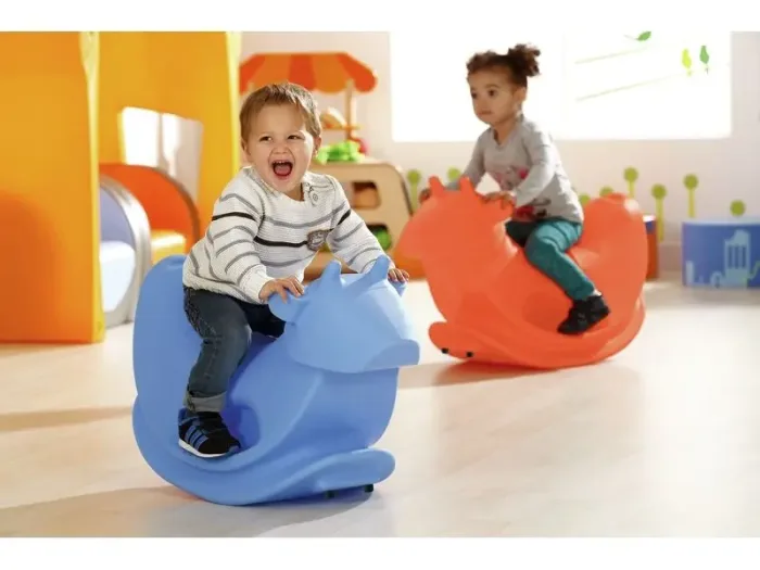 Bull Rider plastic rocker for toddlers developing balance, coordination, and rhythm through gentle back-and-forth play.