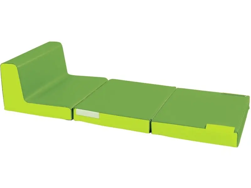 green convertible chair extended for comfortable lounging or reading in inclusive learning environments
