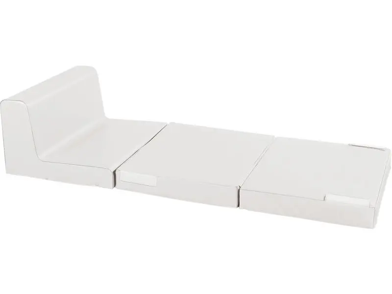 white convertible chair extended into lounge form providing flexible comfort for reading, relaxation, or therapy sessions