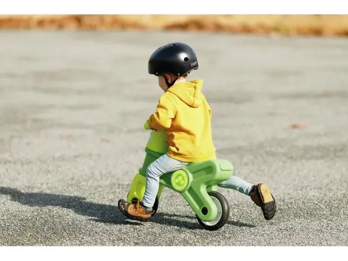 Green Motorcycle toddler bike encouraging movement, balance, and early-stage motor skill development.