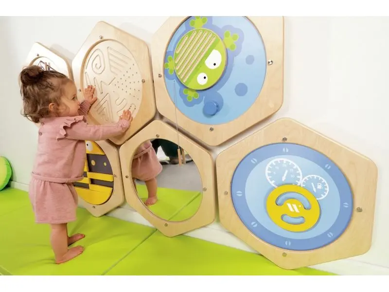 set of hexagonal sensory activity panels combining textures, shapes, and colours to encourage tactile exploration