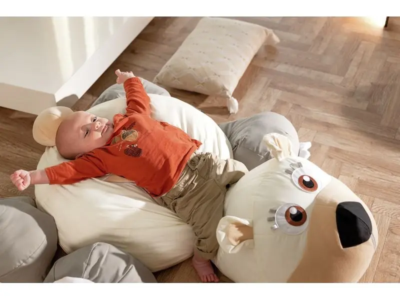 friendly bear cushion combining tactile softness and supportive structure for calm spaces