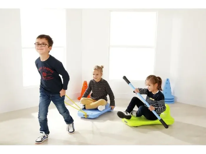 Ovi’Slide Complete Kit low-profile balance board promoting bilateral coordination and upper-body strength with rope.