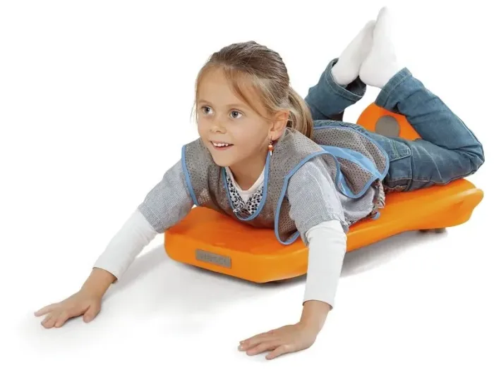 Ovi’Slide Complete Kit ergonomic board with rounded edges for safe seated gliding in therapy and classroom motor labs.