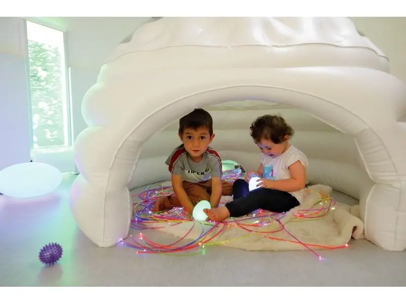 enclosed inflatable structure promoting balance between stimulation and calm for sensory comfort