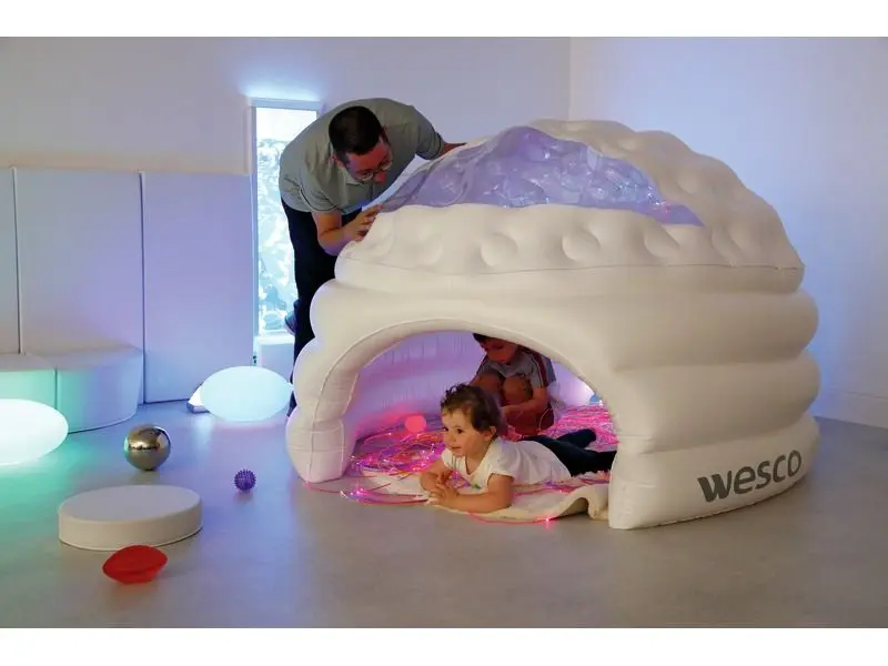 soft-sided inflatable igloo providing safety, comfort, and sensory relief in active settings