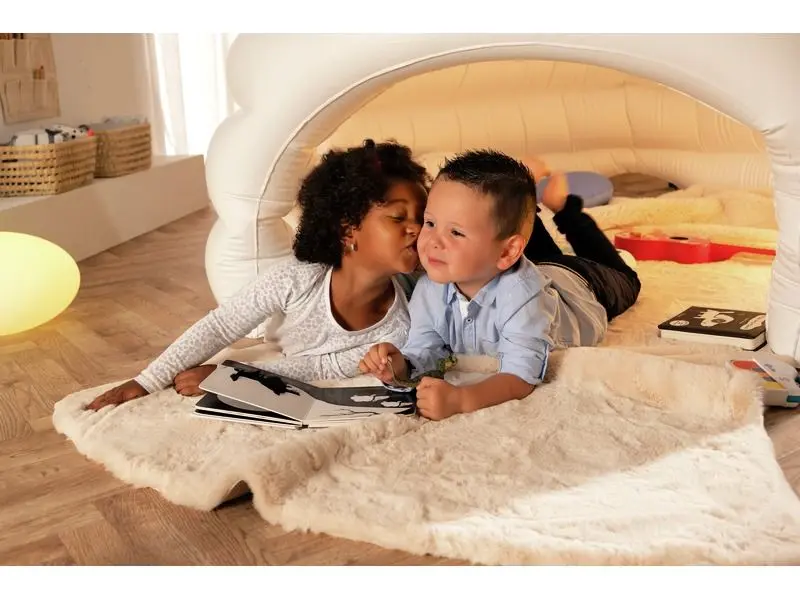 portable inflatable enclosure creating a controlled sensory zone for rest and regulation