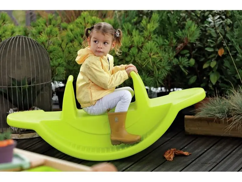 Three Seat Rocker light-green plastic rocker for group play helping toddlers develop balance, rhythm, and coordination.