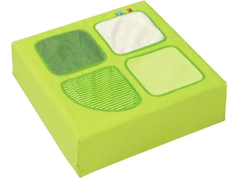 soft foam quarter cube with textured surfaces encouraging sensory stimulation, touch exploration, and early learning play
