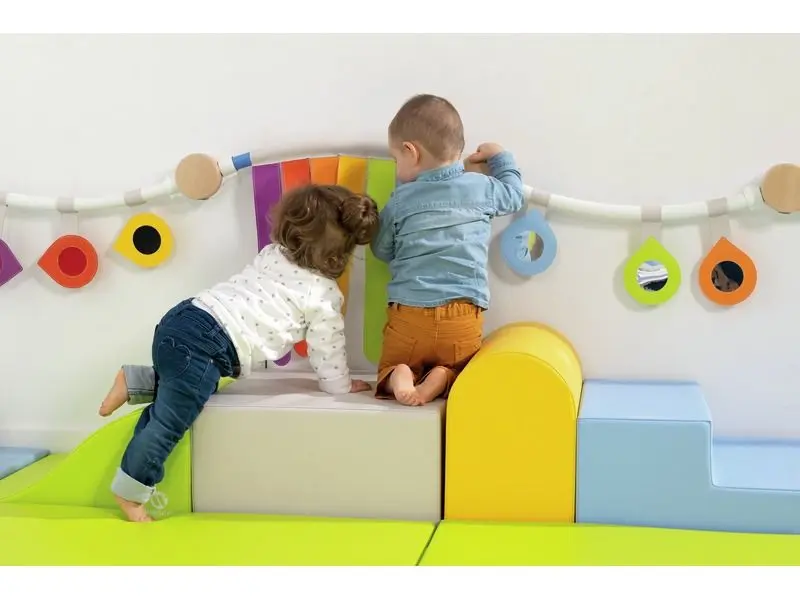 wavy foam shape promoting strength, body awareness, and sensory engagement during open-ended play