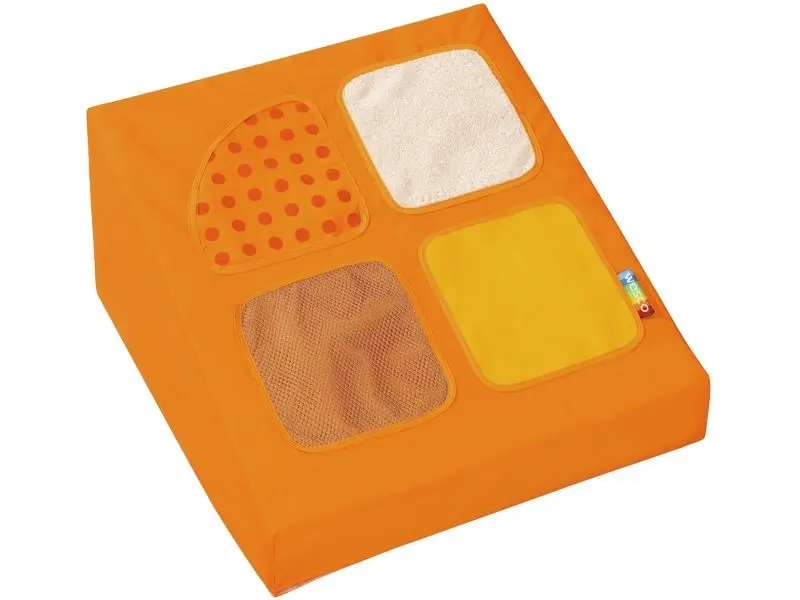 soft foam trapezium block with tactile textures designed to support sensory discovery and hands-on exploratory play