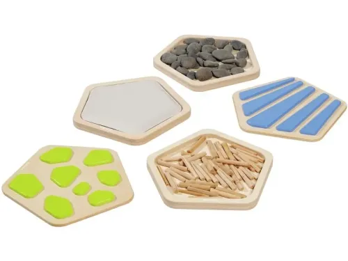 wooden tiles arranged as a sensory path encouraging active movement and creative problem-solving